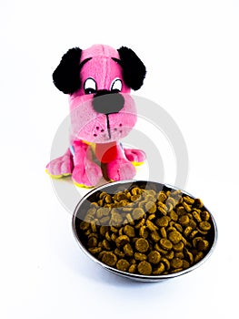 Little pink toy puppy dog sitts